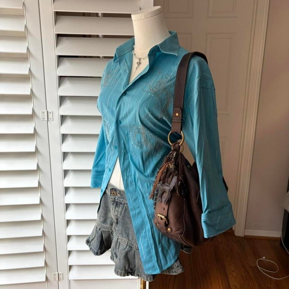 Turquoise embroidered button-up top • *
